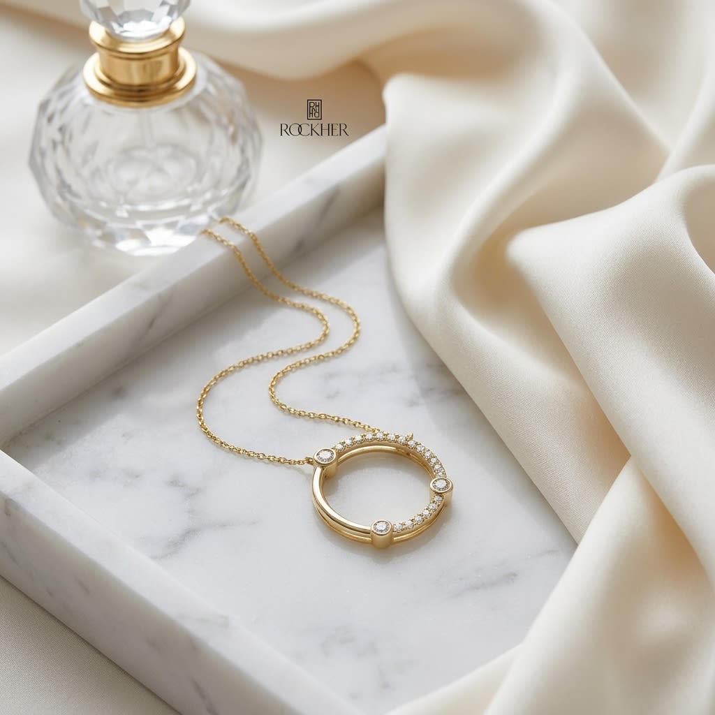Diamond Circle Necklace With Bezel And High Polish Accent in 14K Yellow Gold, on marble vanity tray with silk