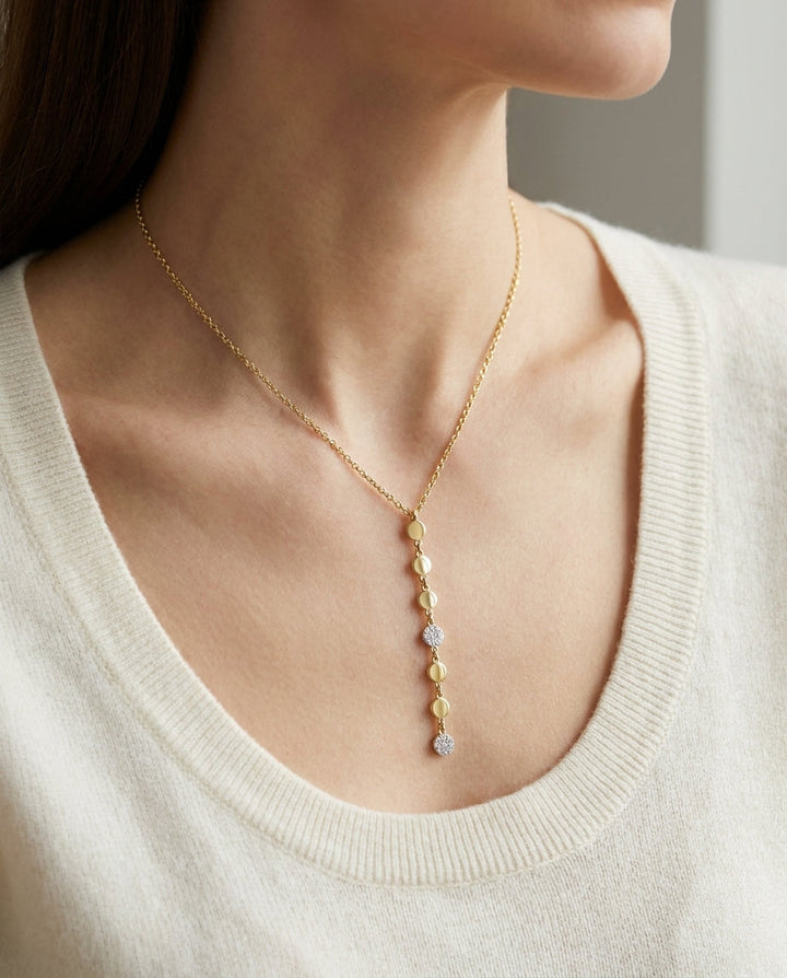 Diamond Linear Drop Necklace in 14k Yellow Gold 0.09ctw, worn close-up portrait