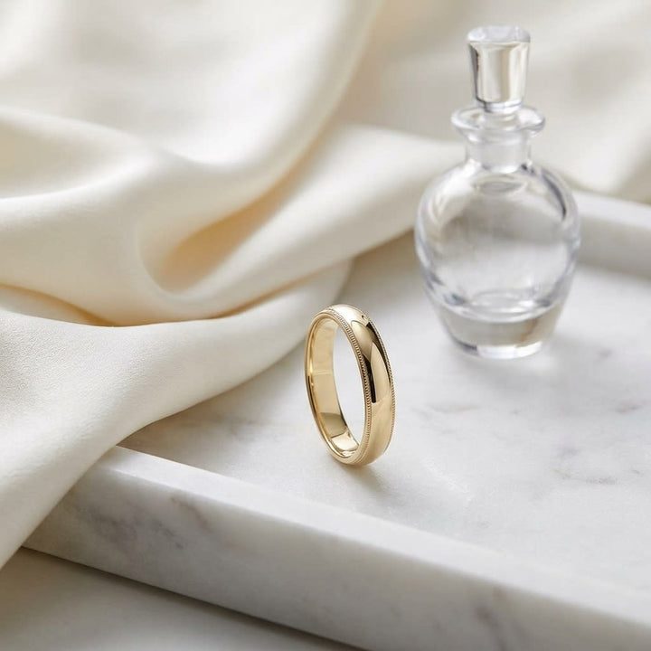 แหวนแต่งงาน ทรงรี ตัวเรือนทองคำเหลือง 14K จาก RockHer