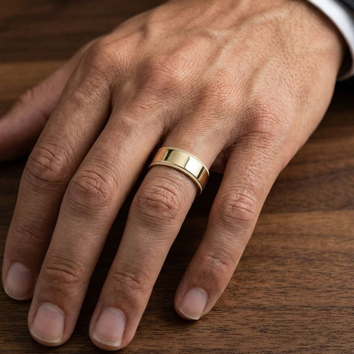 8mm Flat Milgrain Comfort-Fit Wedding Band in 14K Yellow Gold, worn on hand, masculine close-up