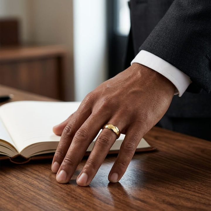 7.5mm Comfort-Fit Wedding Band in 14K Yellow Gold, worn on hand, masculine full view