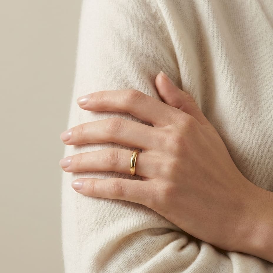 3mm High Dome Comfort-Fit Wedding Band in 14K Yellow Gold, worn on hand, full view