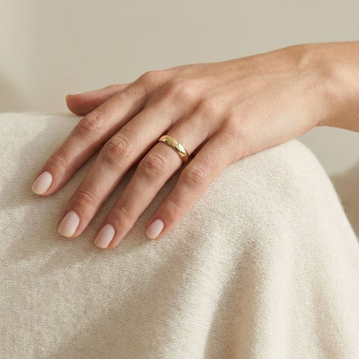 4mm Low Dome Wedding Band in 14K Yellow Gold, worn on hand, full view