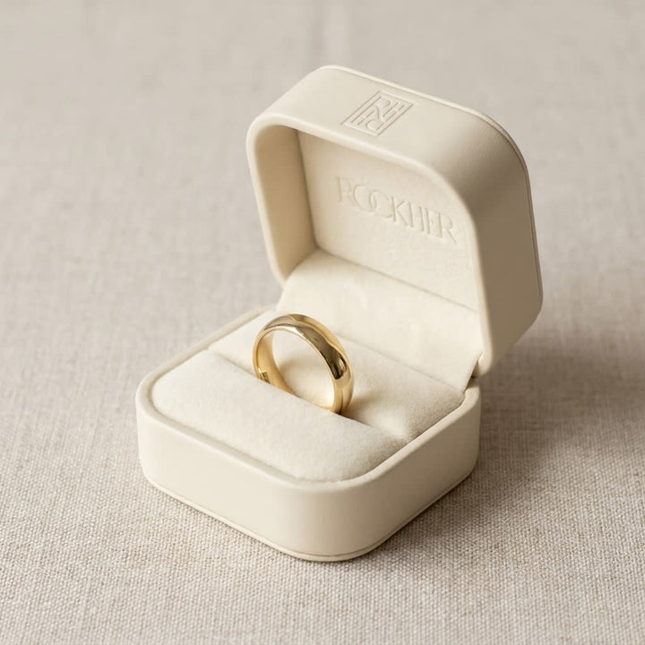 4mm Low Dome Wedding Band in 14K Yellow Gold, in navy velvet jewelry box