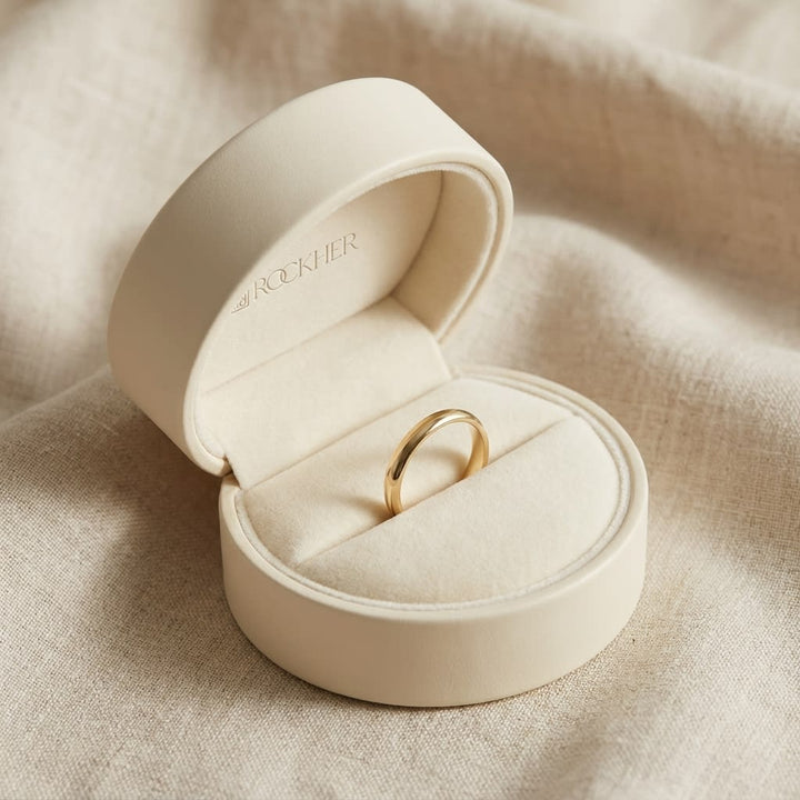 2mm Slightly Domed Comfort-Fit Wedding Band in 14K Yellow Gold, in navy velvet jewelry box