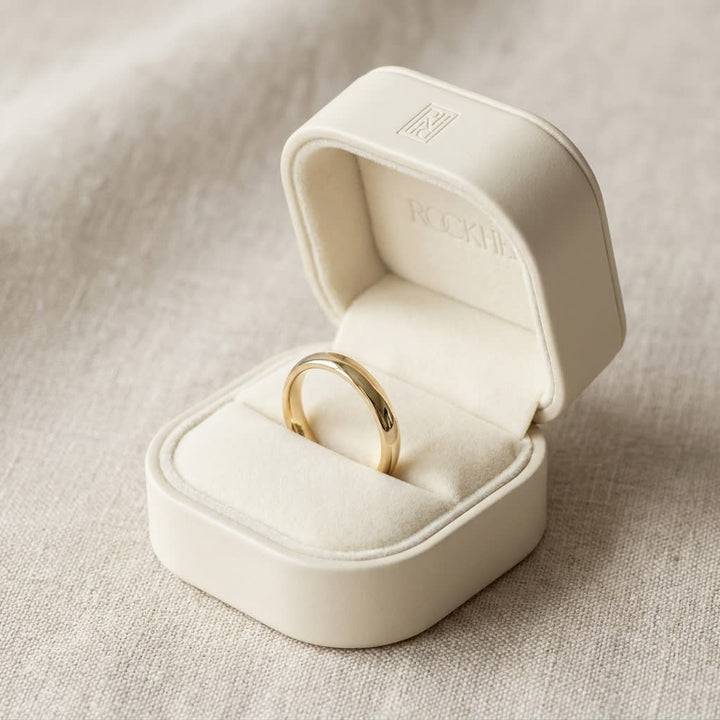 3mm Slightly Domed Comfort-Fit Wedding Band in 14K Yellow Gold, in navy velvet jewelry box