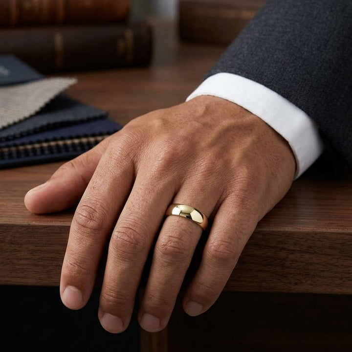6mm Slightly Domed Comfort-Fit Wedding Band in 14K Yellow Gold, worn on hand, masculine full view