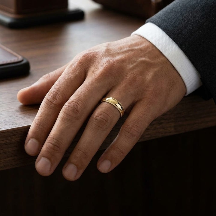 5mm Slightly Domed Milgrain Comfort-Fit Wedding Band in 14K Yellow Gold, worn on hand, masculine full view