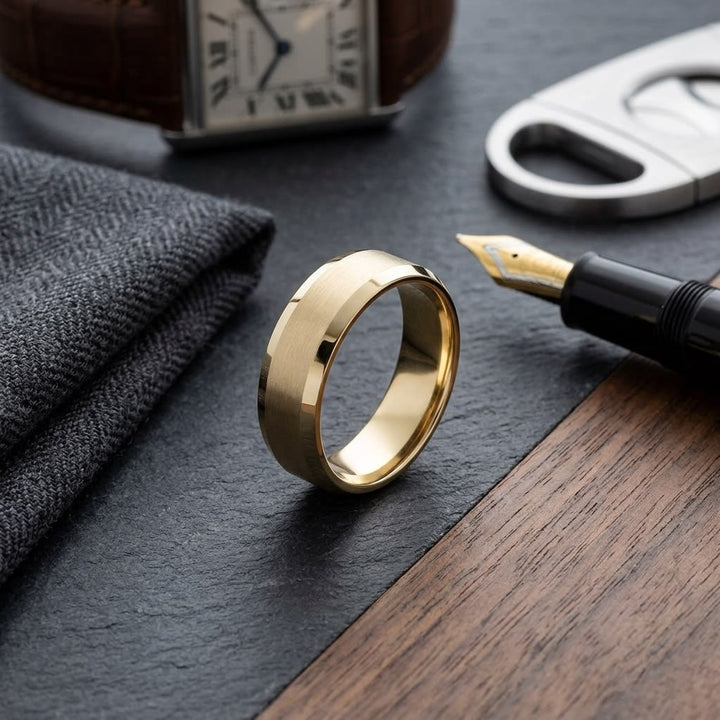 7mm Satin Finish High Polished Beveled Edge Carved Wedding Band in 14K Yellow Gold, on walnut surface with pocket square