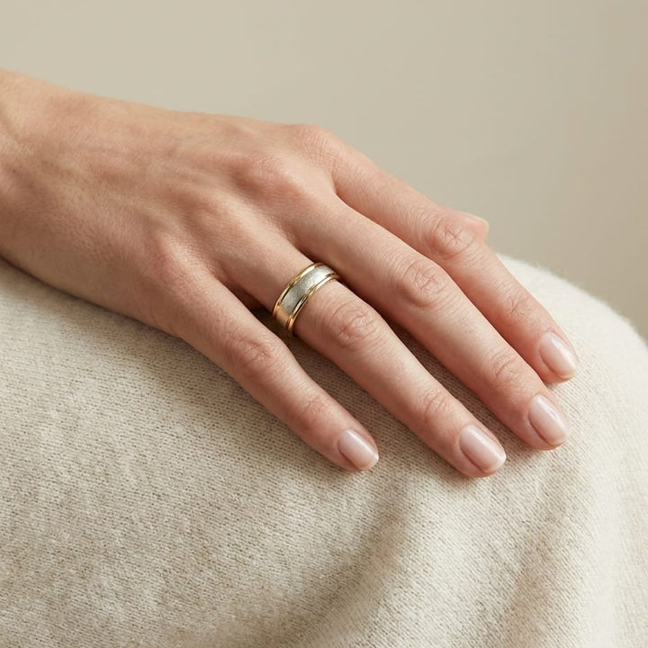 4mm Wired Finish High Polished Round Edge Carved Wedding Band in 14K Yellow Gold, worn on hand, full view