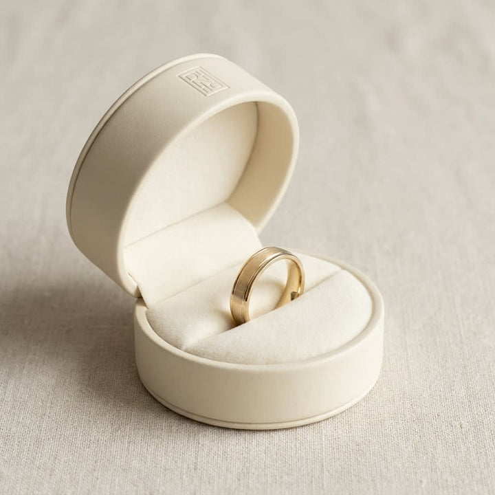 4mm Satin Finish High Polished Round Edge Carved Wedding Band in 14K Yellow Gold, in navy velvet jewelry box