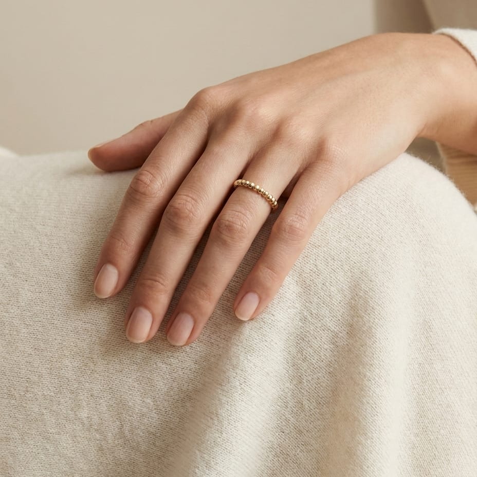 2mm Comfort-Fit Wedding Band in 14K Yellow Gold, worn on hand, full view