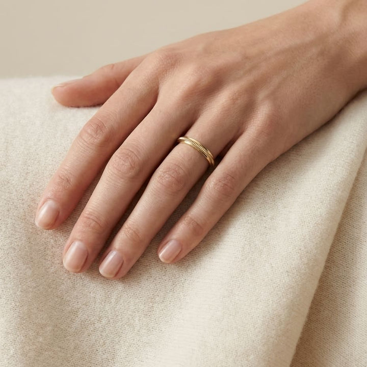 2mm High Polish Milgrain Round Edge Carved Wedding Band in 14K Yellow Gold, worn on hand, full view