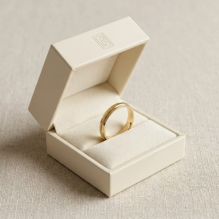 2mm High Polish Milgrain Round Edge Carved Wedding Band in 14K Yellow Gold, in navy velvet jewelry box