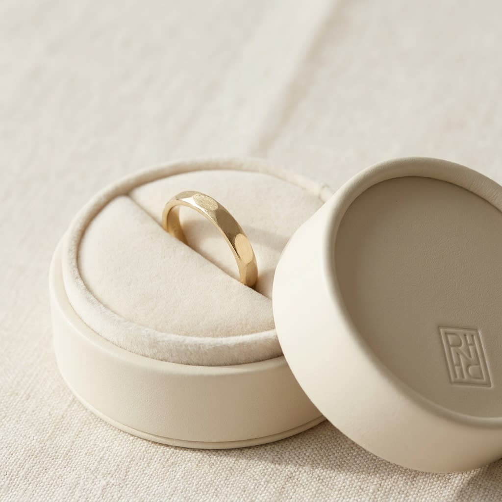 2mm High Polish Carved Wedding Band in 14K Yellow Gold, in navy velvet jewelry box