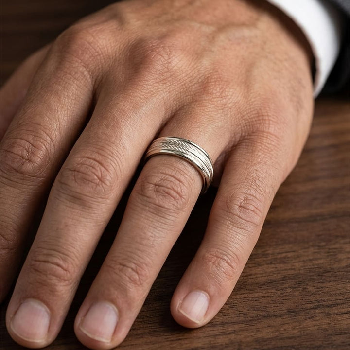 6mm High Polish Milgrain Round Edge Carved Wedding Band in 14K Yellow Gold, worn on hand, masculine close-up