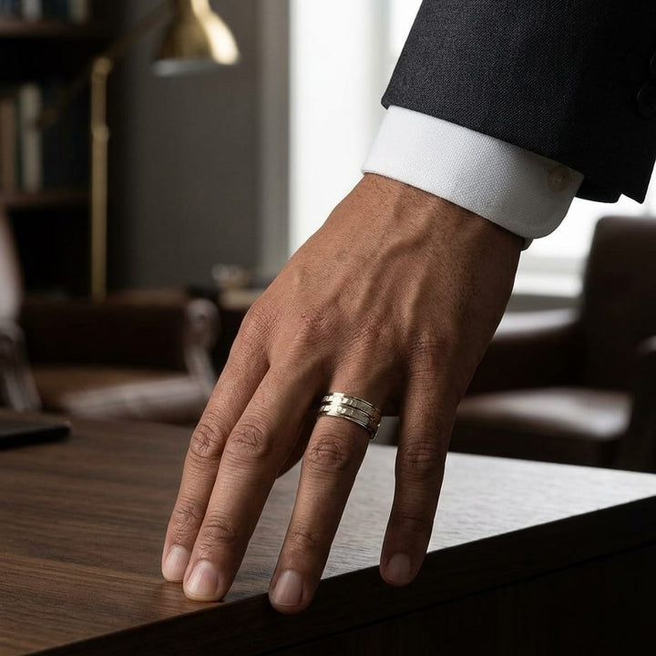 7.5mm High Polish Round Edge Carved Wedding Band in 14K Yellow Gold, worn on hand, masculine full view