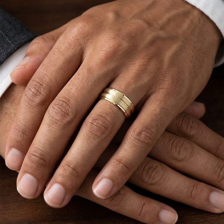 8mm Satin Finish High Polished Center Cut Carved Wedding Band in 14K Yellow Gold, worn on hand, masculine close-up