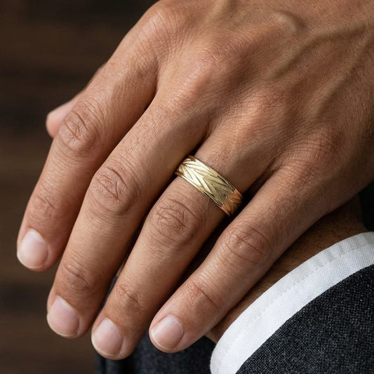 7mm Comfort-Fit Wedding Band in 14K Yellow Gold, worn on hand, masculine close-up