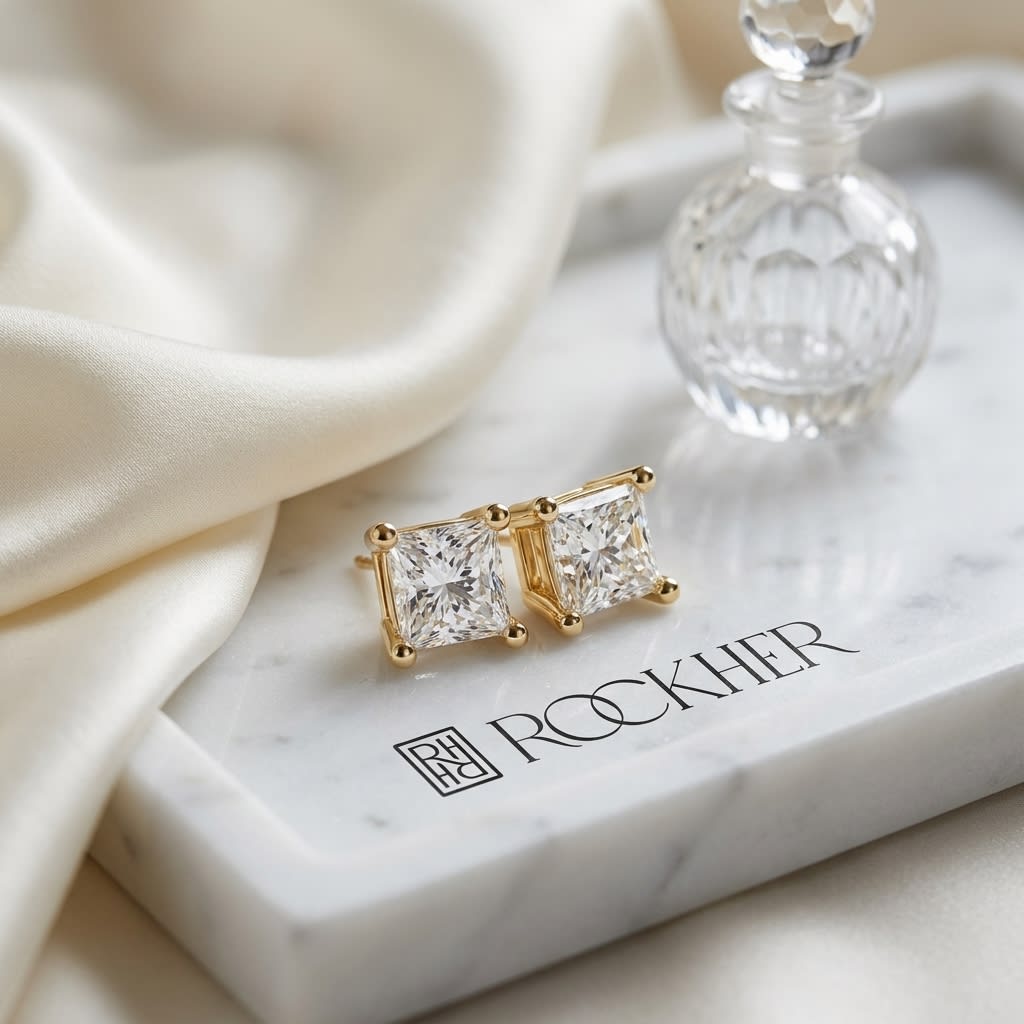 14k Yellow Gold 4-prong Princess Diamond Stud Earrings (0.25 Ct. T.w., Vs1-vs2 Clarity, F-g Color), on marble vanity tray with silk