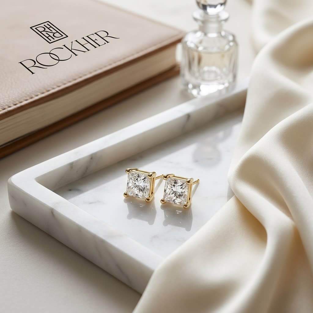 14k Yellow Gold 4-prong Princess Diamond Stud Earrings (0.25 Ct. T.w., Si1-2 Clarity, H-i Color), on marble vanity tray with silk