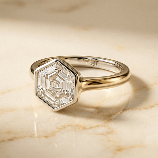 The Agnes Select bezel solitaire hexagonal engagement ring in 18k white gold — alt-angle hero — RockHer