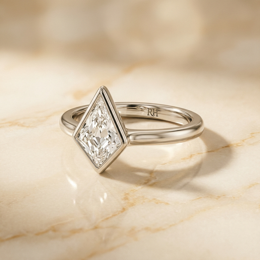 The Agnes Select bezel solitaire kite engagement ring in 18k white gold — alt-angle hero — RockHer
