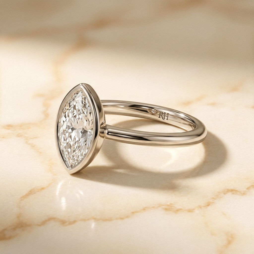 The Agnes Select bezel solitaire marquise engagement ring in 18k white gold — alt-angle hero — RockHer