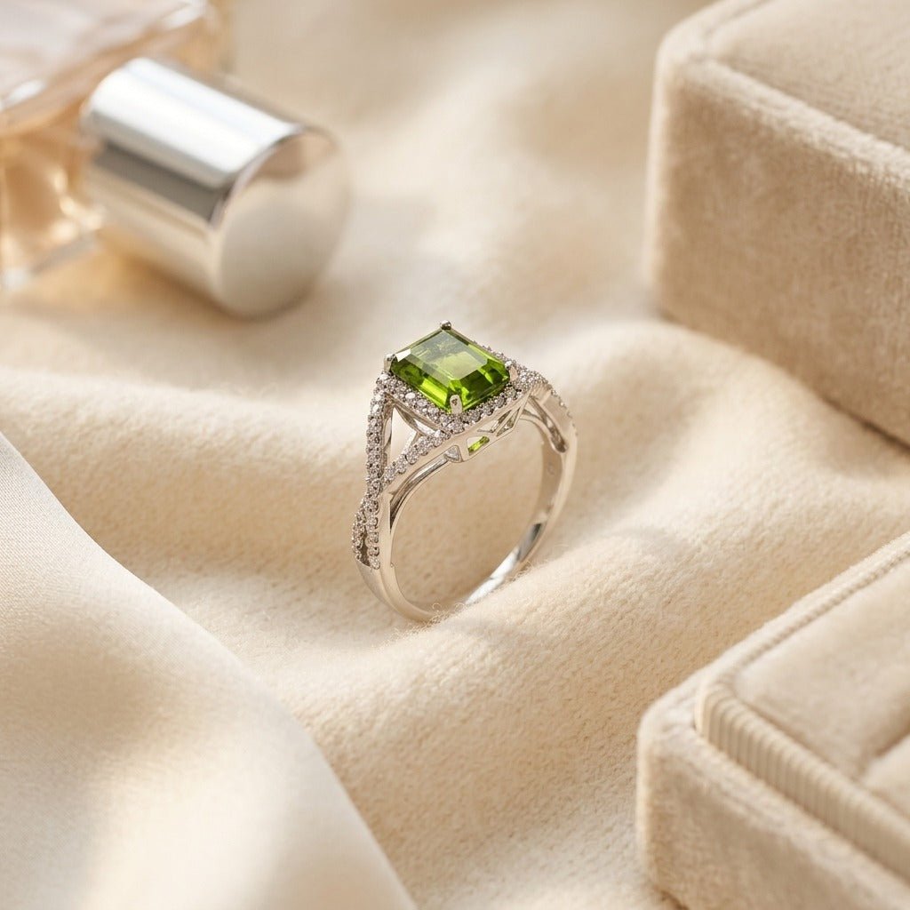 Peridot & Diamond Infinity Twist Ring in Platinum - flat lay