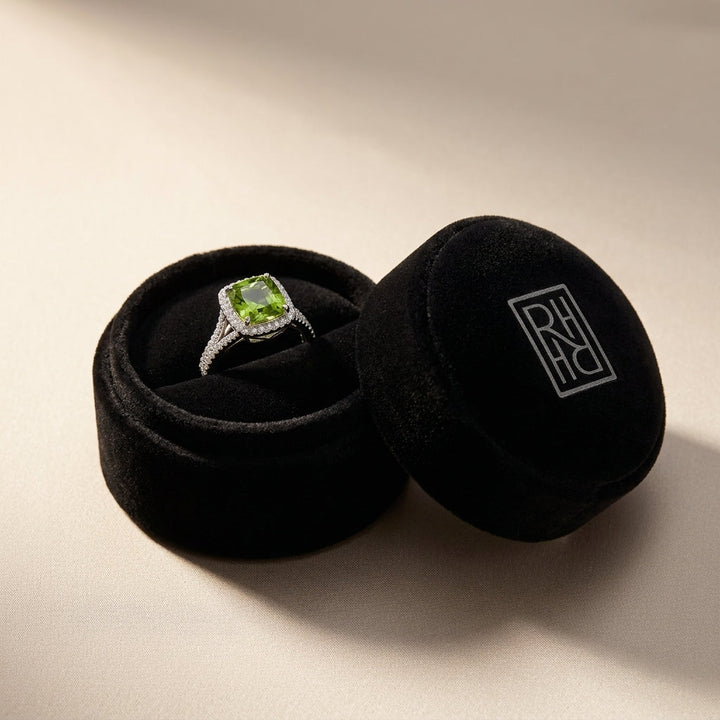 Peridot & Diamond Infinity Twist Ring in Platinum - presentation