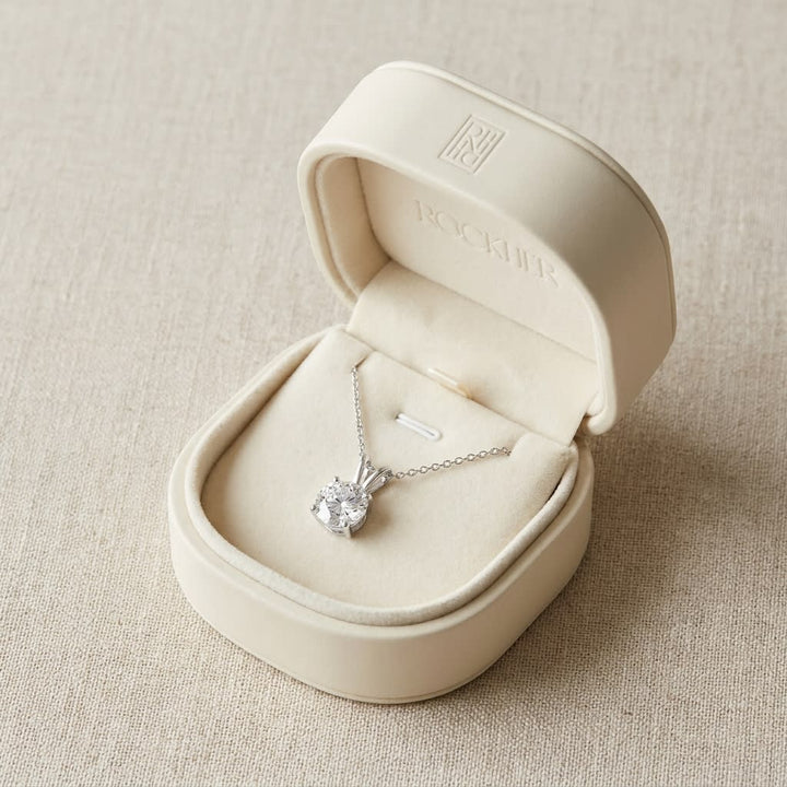 Natural Diamond Round Brilliant Solitaire Pendant in Platinum, 4 ct. t.w., in navy velvet jewelry box