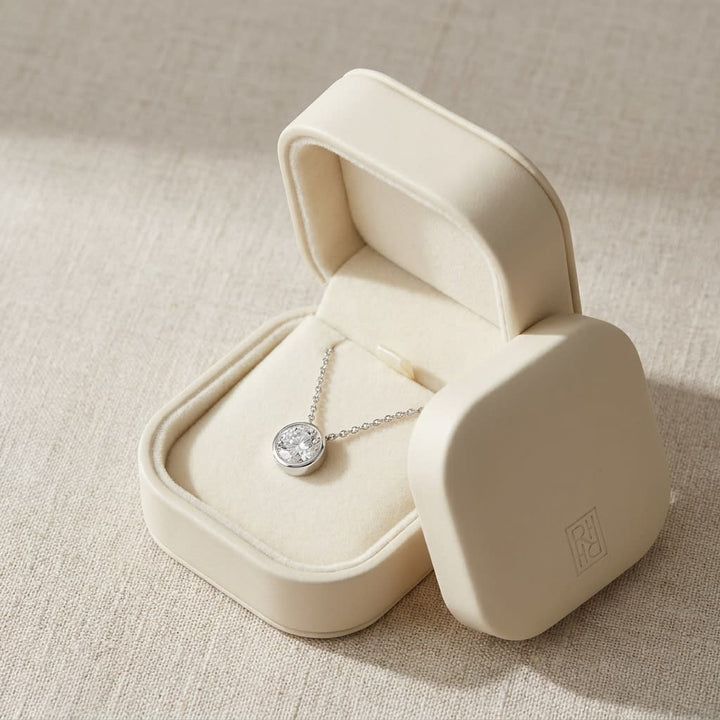 Natural Diamond Round Brilliant Solitaire Pendant in Platinum, 4 ct. t.w., in navy velvet jewelry box
