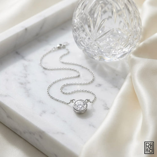 Natural Diamond Round Brilliant Solitaire Pendant in Platinum, 4 ct. t.w., on marble vanity tray with silk