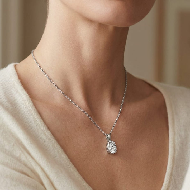 Natural Diamond Oval Solitaire Pendant in Platinum, 2 ct. t.w., worn close-up portrait