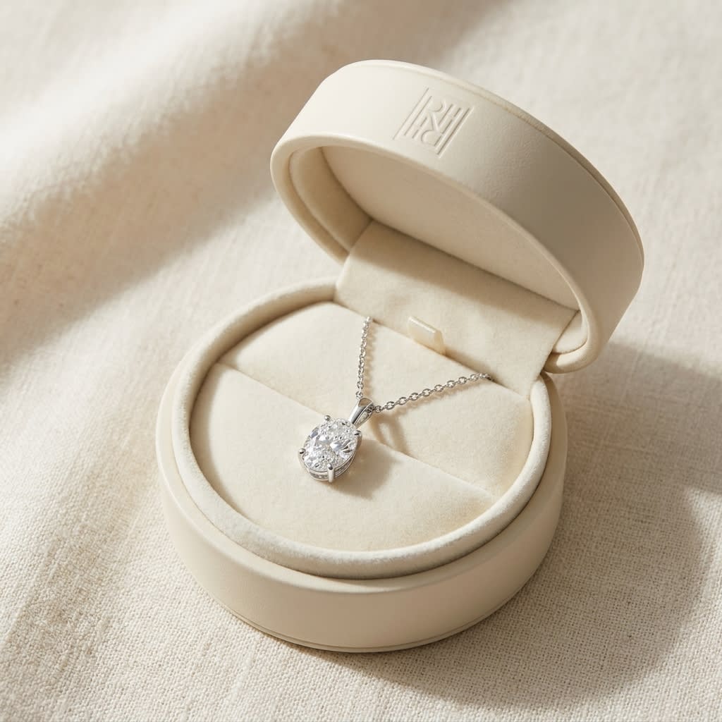 Natural Diamond Oval Solitaire Pendant in Platinum, 2 ct. t.w., in navy velvet jewelry box