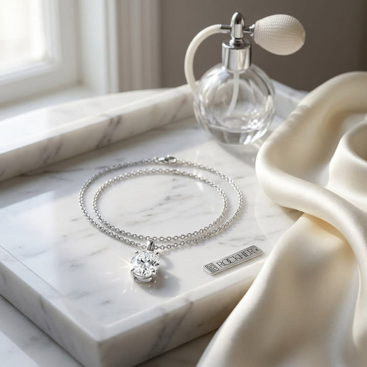 Natural Diamond Oval Solitaire Pendant in Platinum, 4 ct. t.w., on marble vanity tray with silk