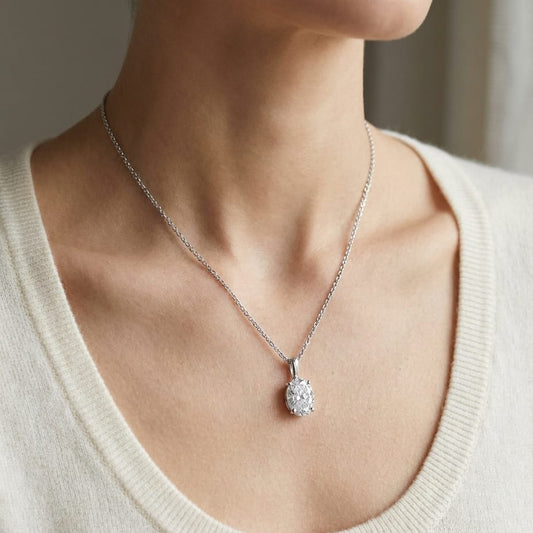 Natural Diamond Oval Solitaire Pendant in Platinum, 4 ct. t.w., worn close-up portrait