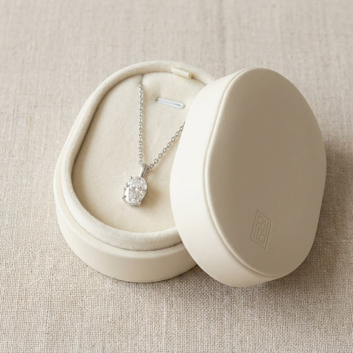 Natural Diamond Oval Solitaire Pendant in Platinum, 2 ct. t.w., in navy velvet jewelry box