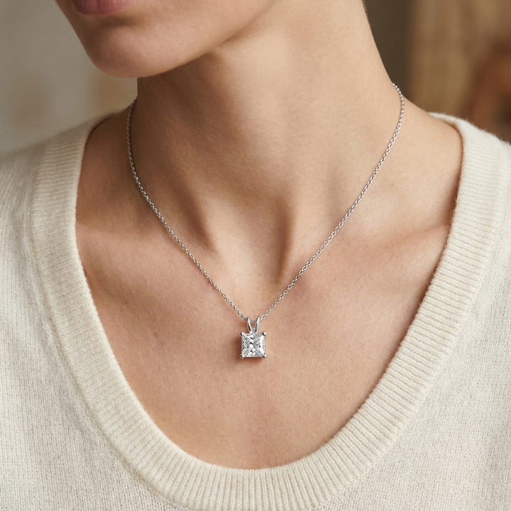Natural Diamond Princess Cut Solitaire Pendant in Platinum, 3 ct. t.w., worn close-up portrait