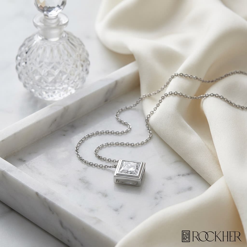 Natural Diamond Princess Cut Solitaire Pendant in Platinum, 4 ct. t.w., on marble vanity tray with silk