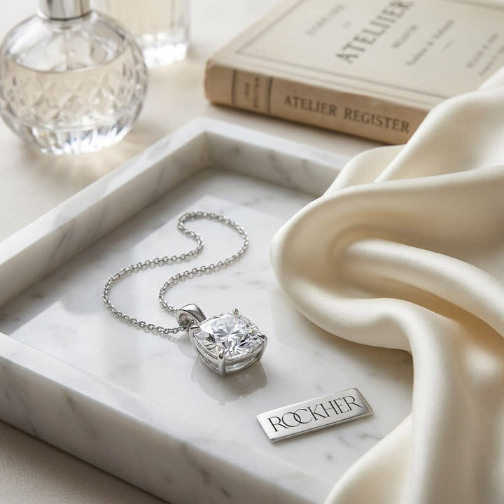 Natural Diamond Cushion Solitaire Pendant in Platinum, 3 ct. t.w., on marble vanity tray with silk