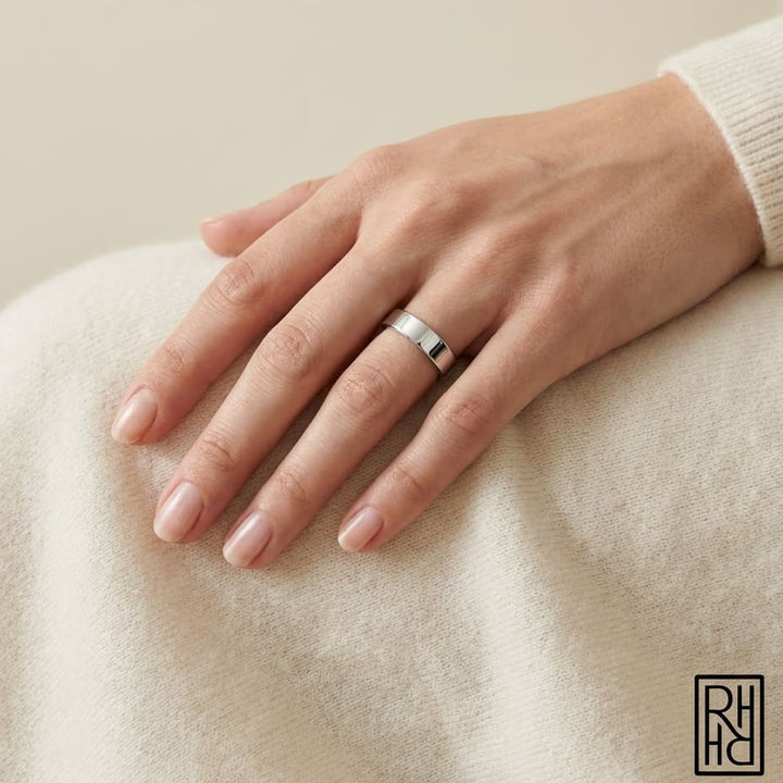 4mm Flat Comfort-Fit Wedding Band in Platinum, worn on hand, full view
