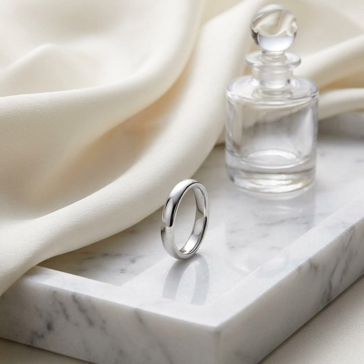 3.5mm Flat Comfort-Fit Wedding Band in Platinum, on marble vanity tray with silk