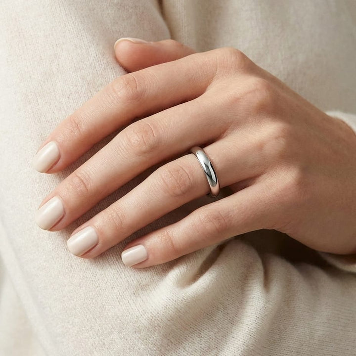 3mm High Dome Comfort-Fit Wedding Band in Platinum, worn on hand, close-up