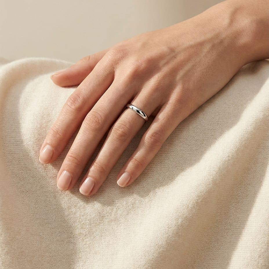 3mm High Dome Comfort-Fit Wedding Band in Platinum, worn on hand, full view