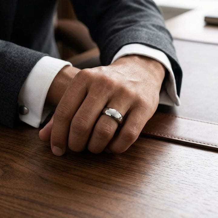 7mm High Dome Comfort-Fit Wedding Band in Platinum, worn on hand, masculine full view