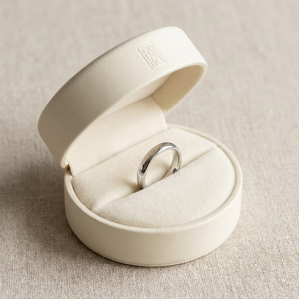 2.5mm Slightly Domed Comfort-Fit Wedding Band in Platinum, in navy velvet jewelry box