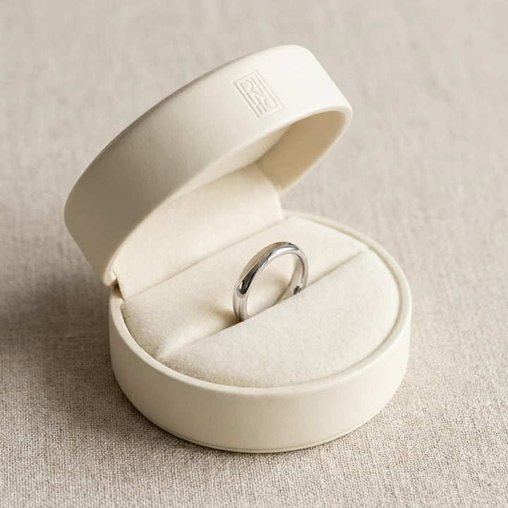 2.5mm Slightly Domed Comfort-Fit Wedding Band in Platinum, in navy velvet jewelry box
