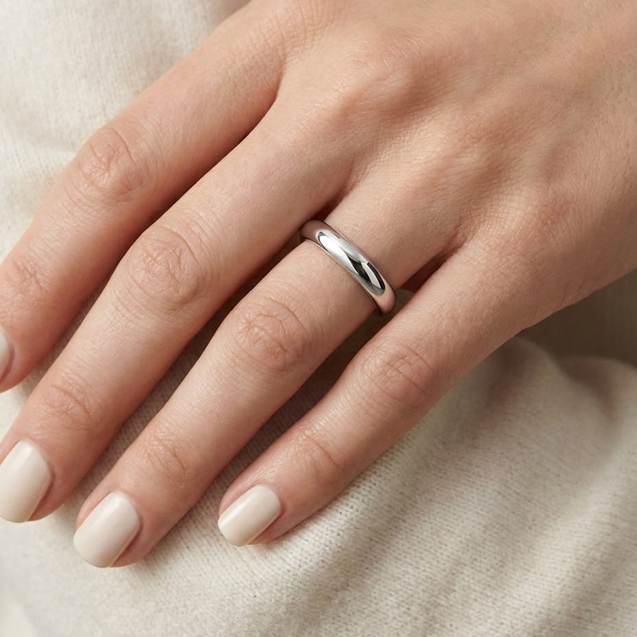 3mm Slightly Domed Comfort-Fit Wedding Band in Platinum, worn on hand, close-up