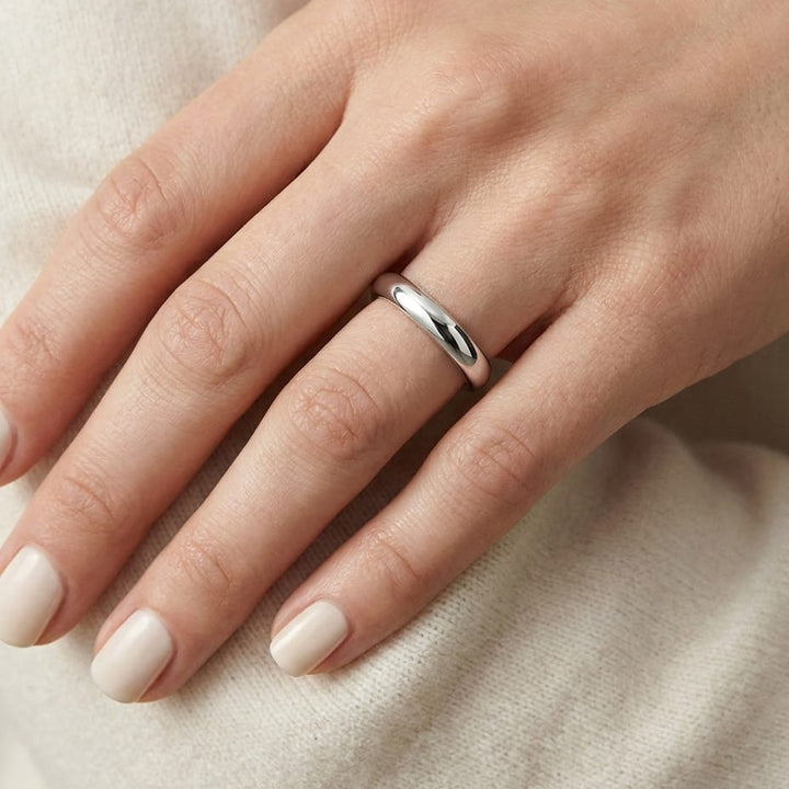 3mm Slightly Domed Comfort-Fit Wedding Band in Platinum, worn on hand, close-up